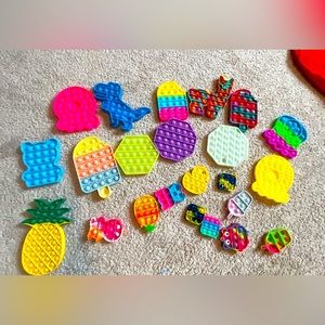 Pop It fidget pack!                                  Includes 10 mini 13 Normal